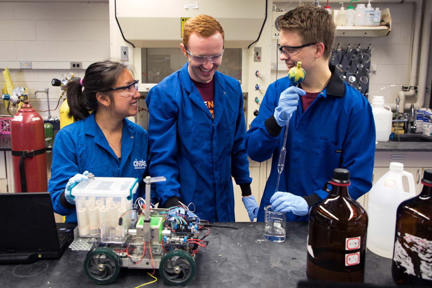 Chemical Engineering students works on a project in a lab.